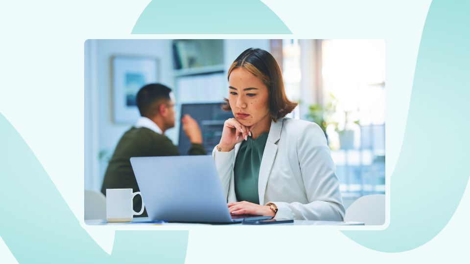 a woman on a computer considering change managment